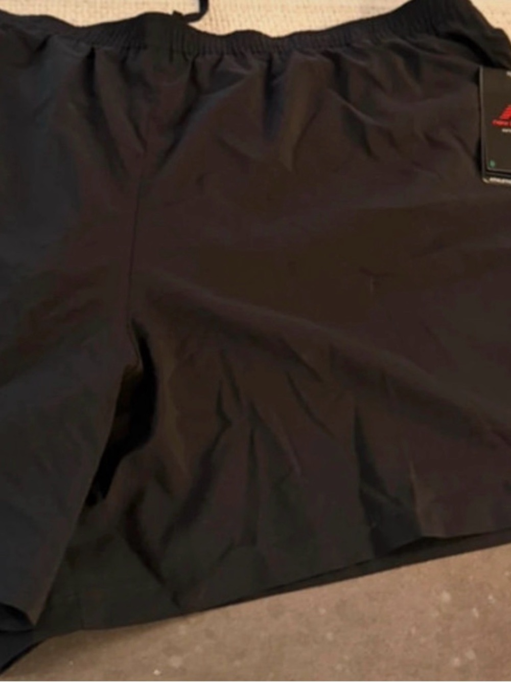 New Balance Black Athletic Shorts with Red Logo